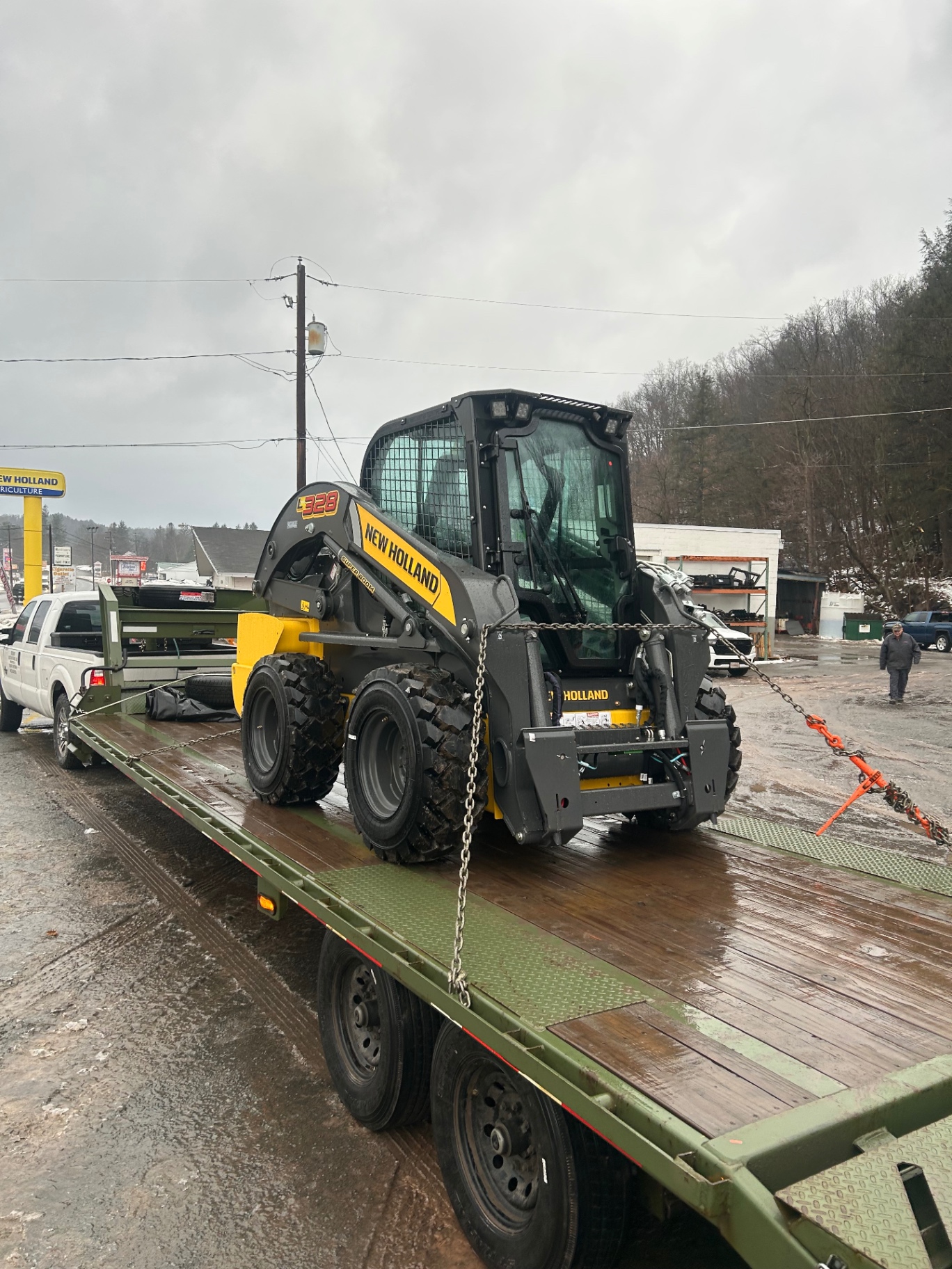 Tracked skid steer loaded for jobsite transport